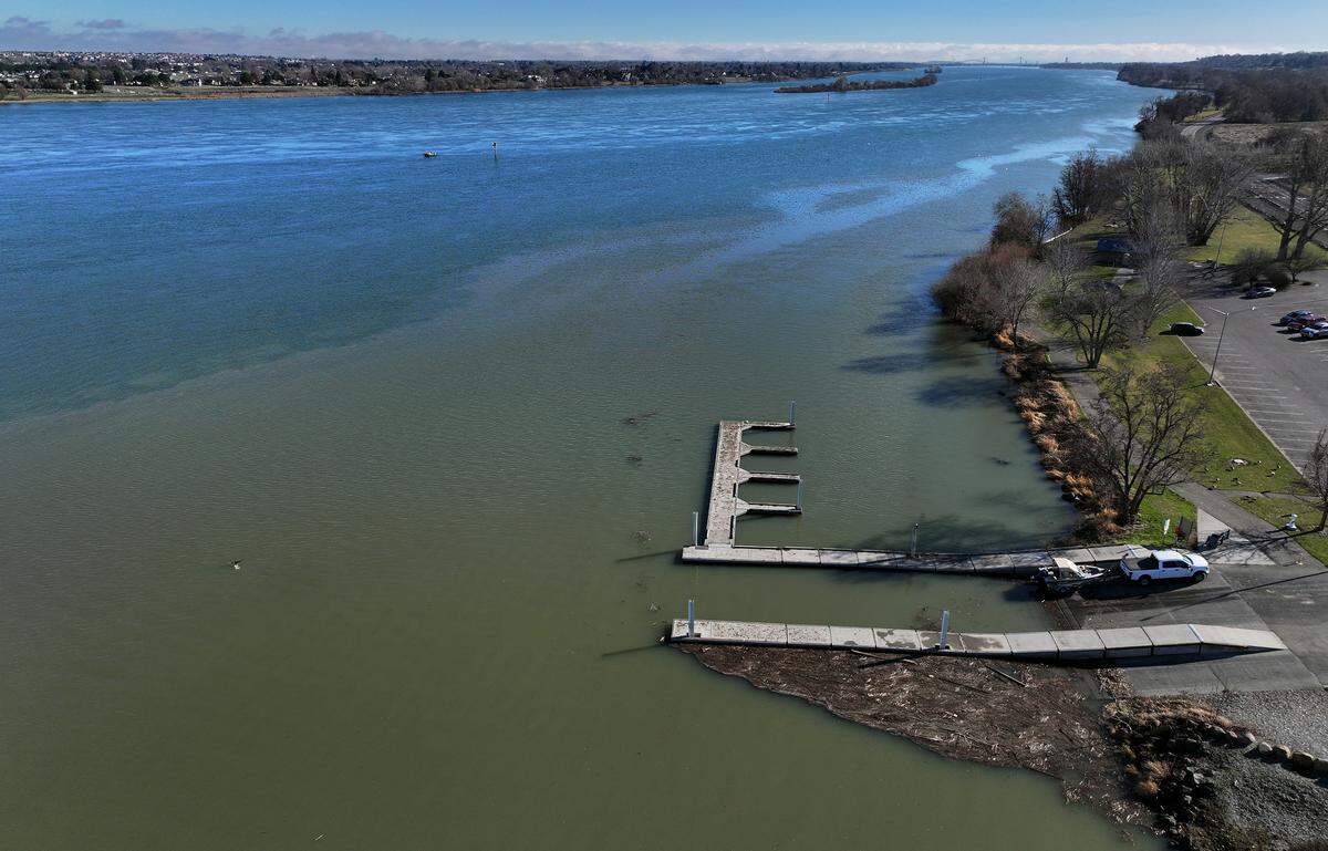 Debris clogs one lane of the boat launch in the West Columbia Park area in Richland.