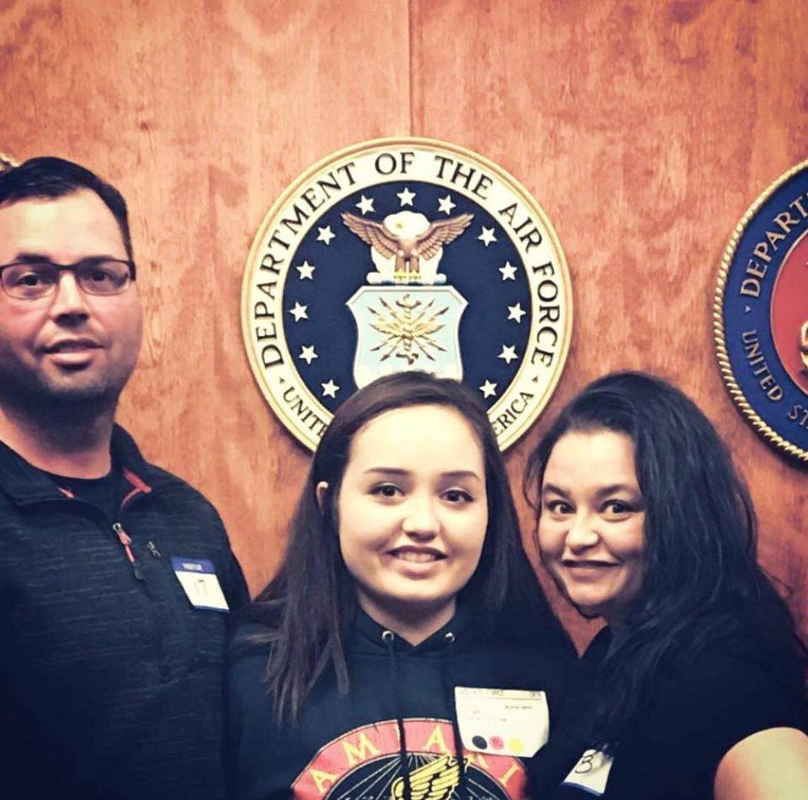 Jazmine Brown with her parents