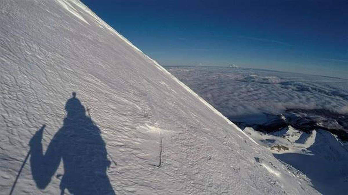 Looking north from Mount Hood with Mount Adams and Mount Rainier in the distance.
