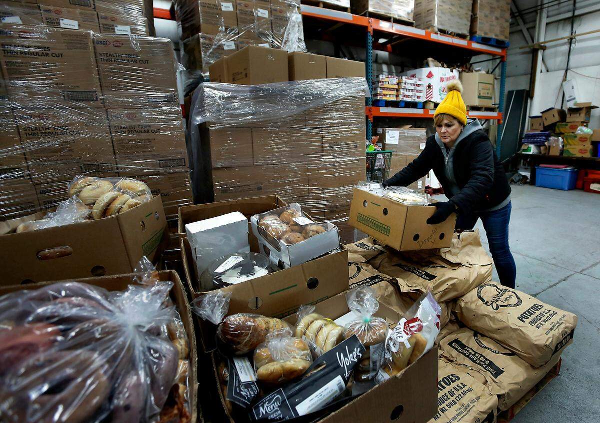 Tammi Diaz is a double-lung transplant recipient and she continues to volunteer four days a week at the Sozo Food Bank in downtown Kennewick.