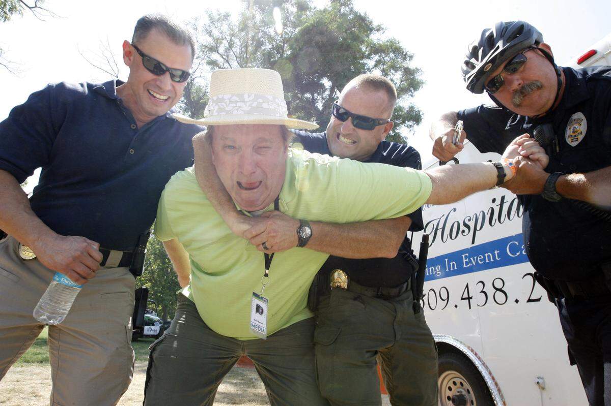 Former Tri-City Herald sports editor Jeff Morrow believed in mingling with the masses in between covering race heats and writing hydroplane stories during Water Follies weekend. Here are the friends he made on a quick stroll in 2013.