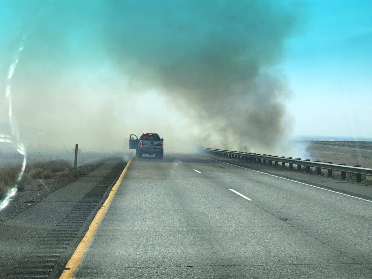 A fire near Coffin Road has shut down Interstate 82 between Kennewci and the Oregon border because of smoke drifting over the road.