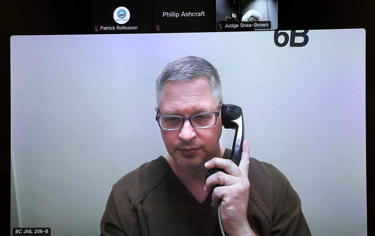 Tri-Cities paraeducator Kevin R. Johnson, 54, appears via video for his preliminary hearing in Benton County Superior Court in April 2026 on charges of using AI software to make child pornography.