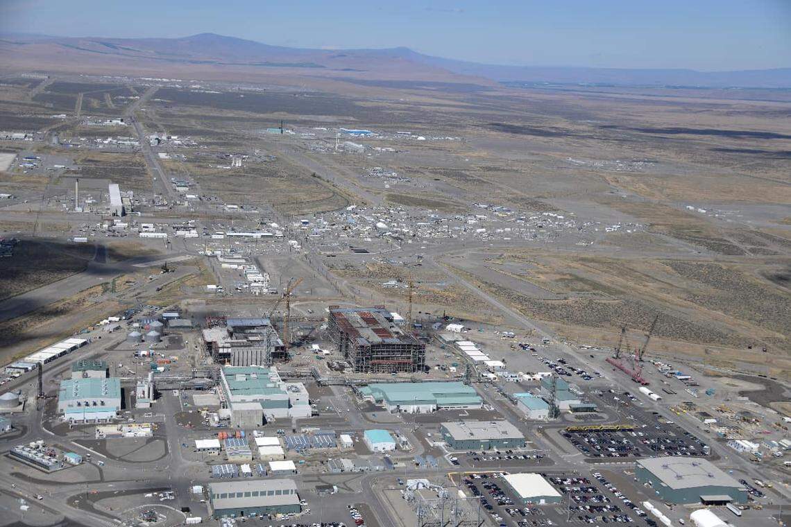 The Hanford vitrification plant, seen in the foreground, is expected to start treating radioactive waste this summer, 23 years after construction began.