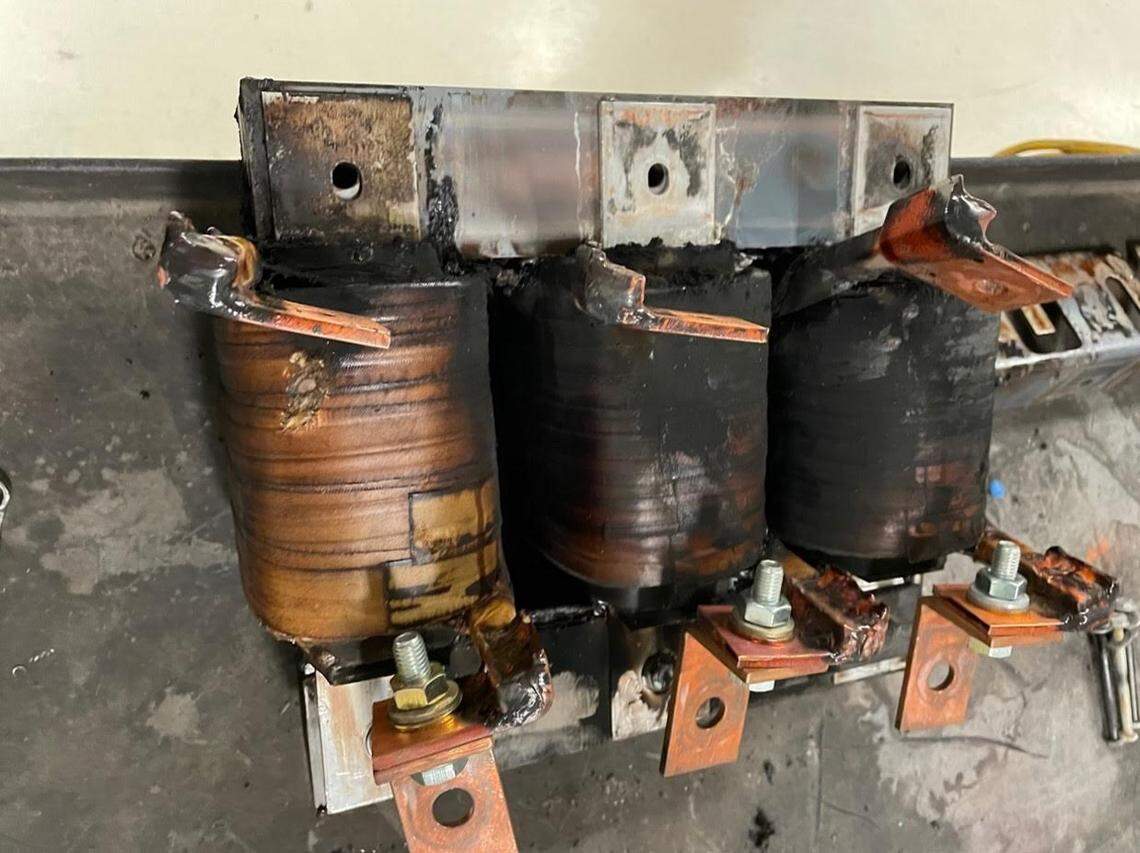 Power supply cabinets for the startup heaters for the first melter to be turned on at the Hanford vitrification plant overheated. Blackened inductors were found after the melter was cooled down.