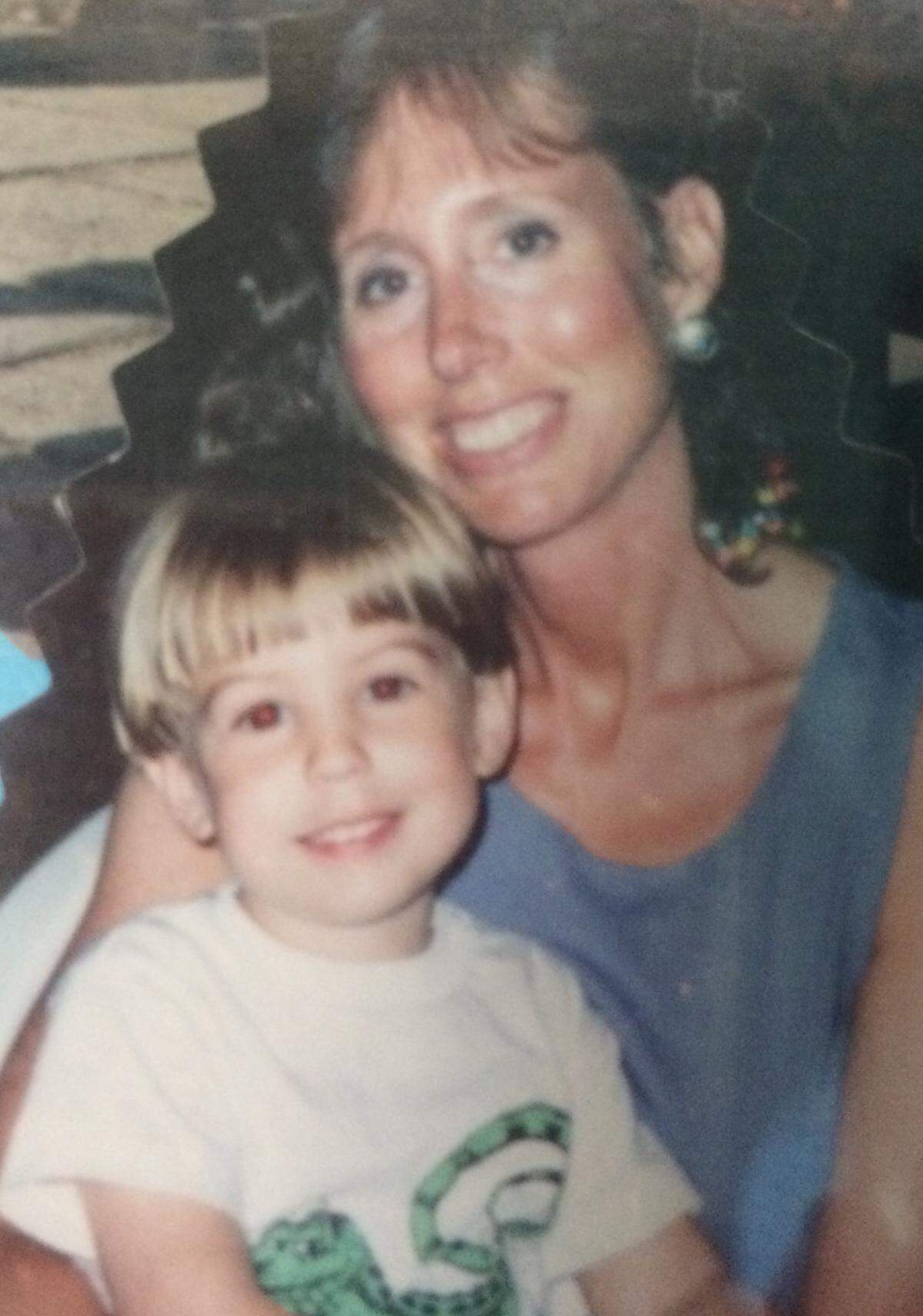 Karyl Stoutenburg holds son Jay close in this 1993 photo.