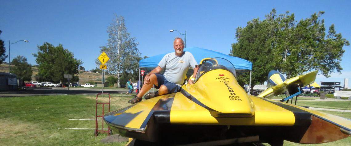 Steve Andrew sits on the Hombre at the Tri-Cities Water Follies. The vintage boat was built in the mid-1970s and was recently restored.