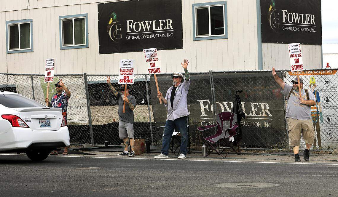 Picketers were outside the construction projects Friday morning off Crosswind Boulevard in Kennewick. IUOE Local 302 represents heavy equipment operators who run excavators, cranes, bulldozers and other construction equipment.