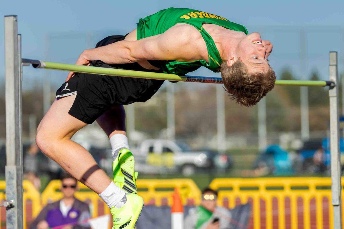 A Hanford student jumps during a March 26 track and field meet.
