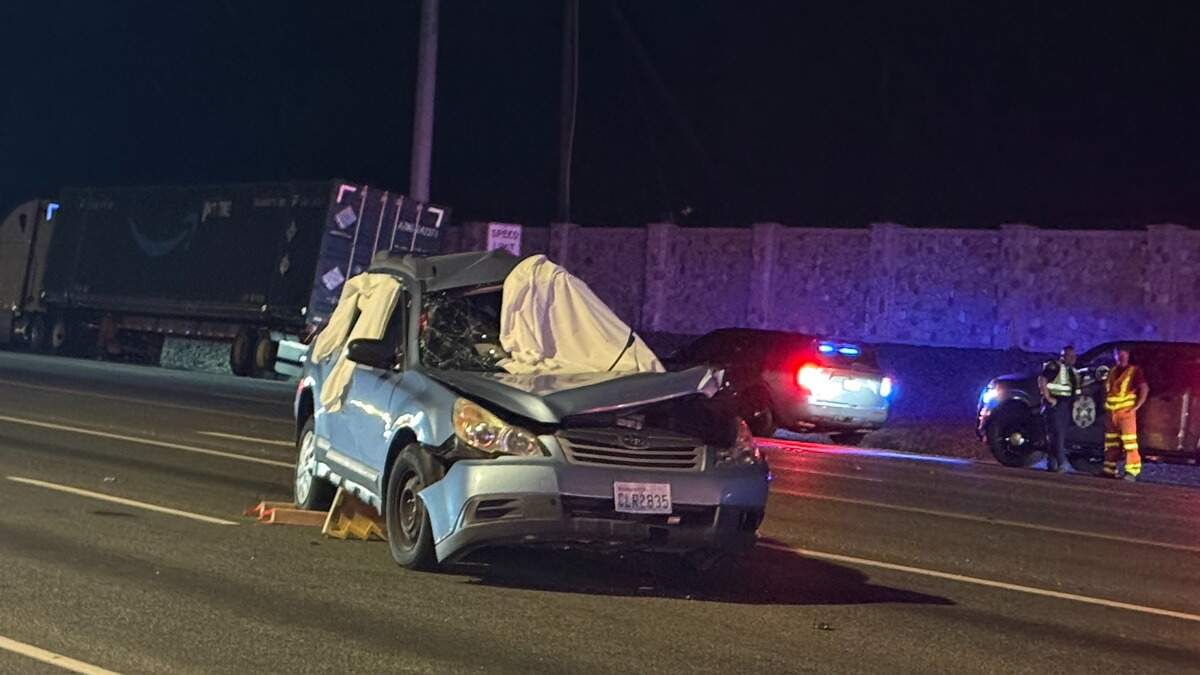 A Richland woman was killed in a crash with a semi truck on the Highway 240 bypass on Friday night.
