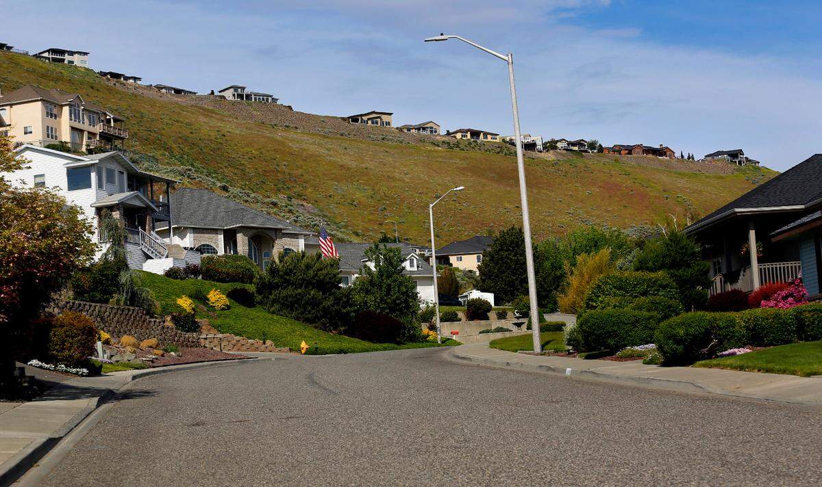 The hillside above homes on View Meadows Court in south Richland is the proposed site of a new condominium project.