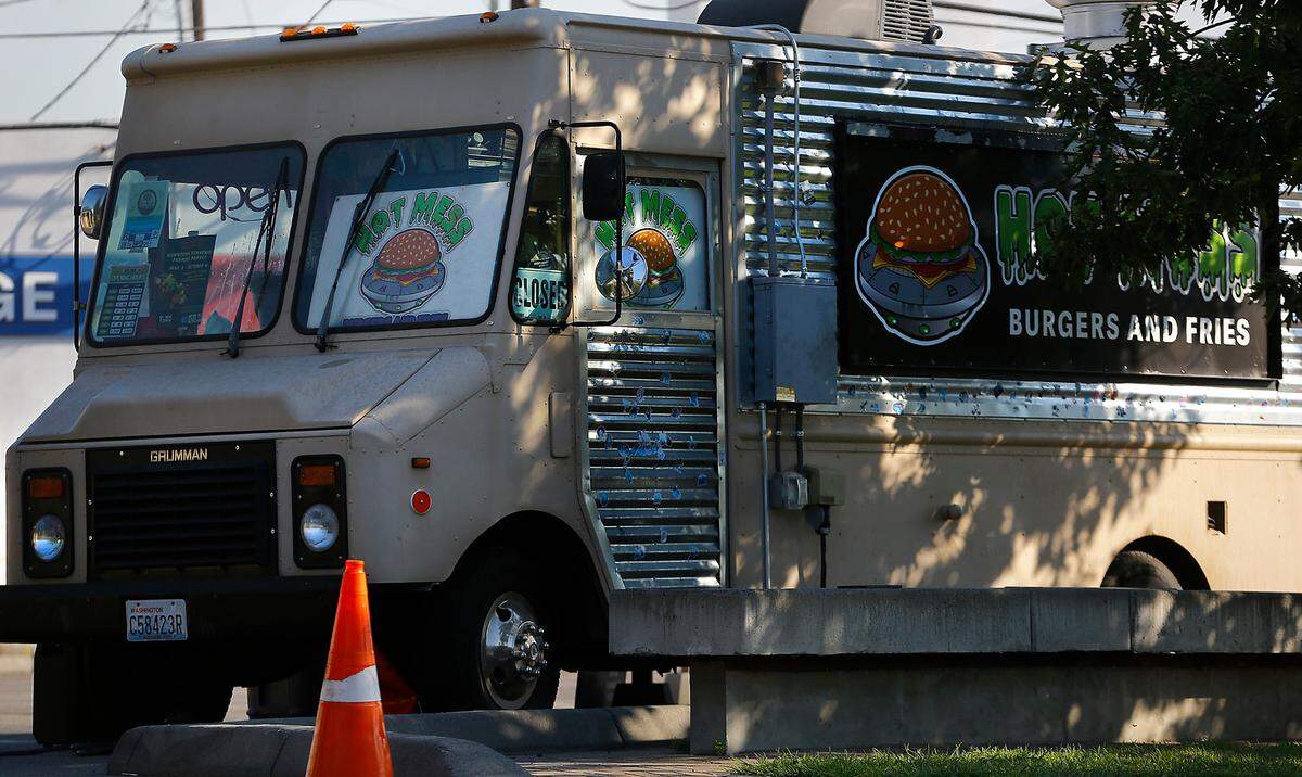 The Hot Mess food truck is parked for business in the downtown Kennewick flag plaza.