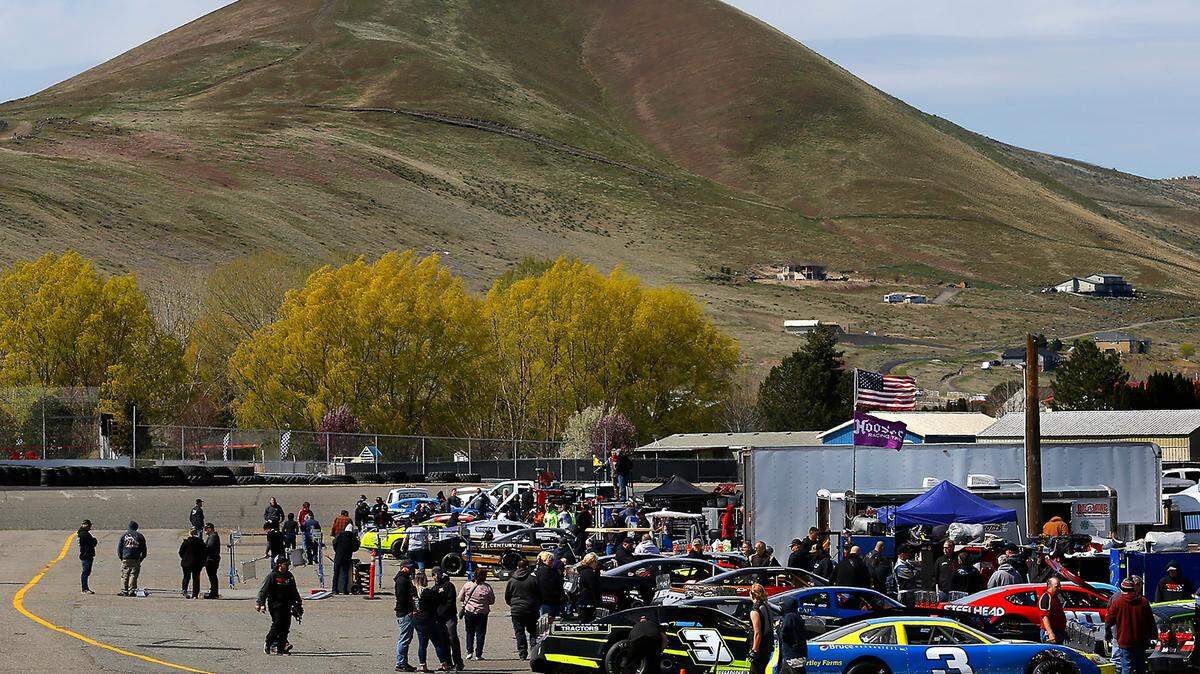 Crews, family members and drivers from about 100 race car teams fill the pits Friday afternoon for the 53rd Annual Bonney’s Bronson Tractors Apple Cup being held this weekend at the Tri-City Raceway at Red Mountain Event Center in West Richland.