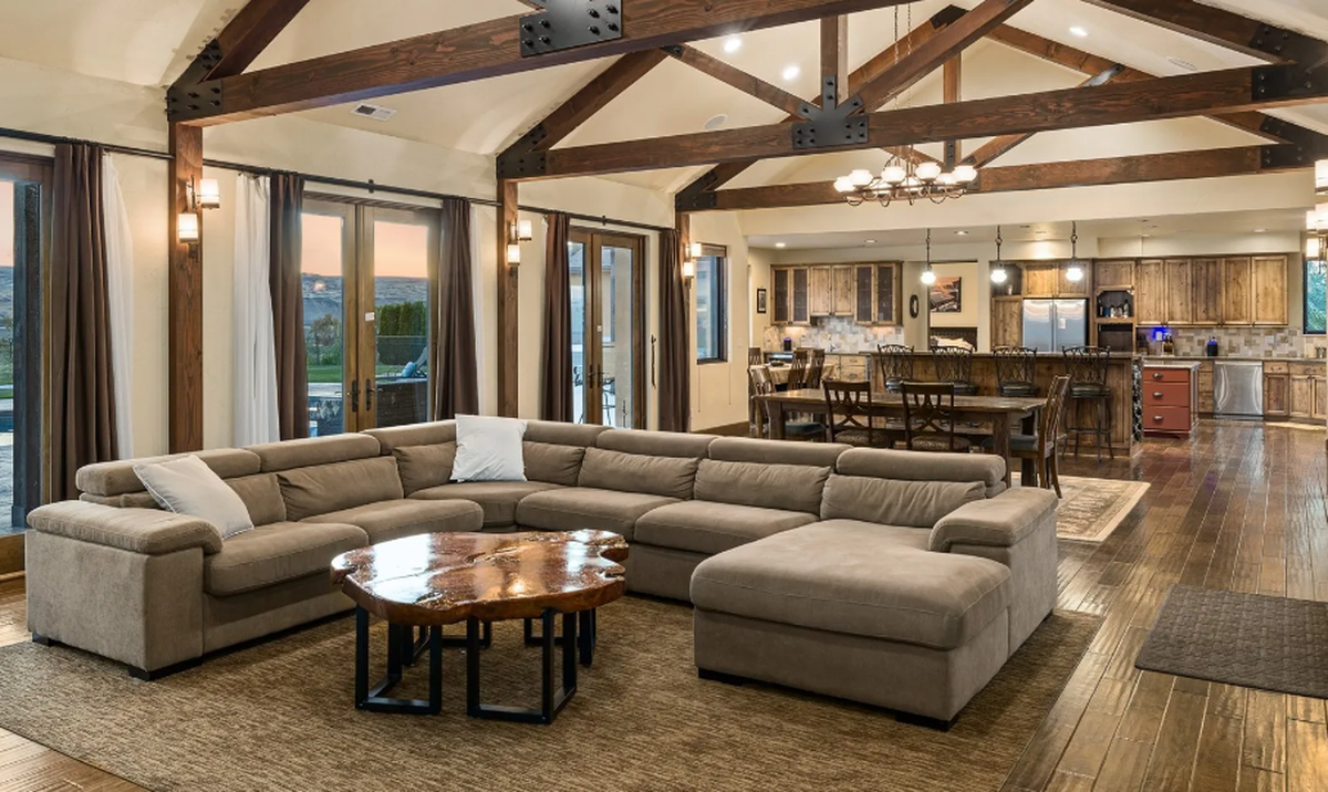 Vaulted ceilings highlight the living room and dining areas.