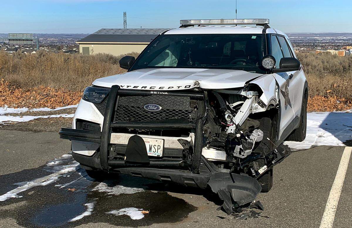 The 2022 Ford Explorer patrol vehicle hit by a suspected impaired wrong way driver early Tuesday morning has heavy front end damage on the driver’s side.