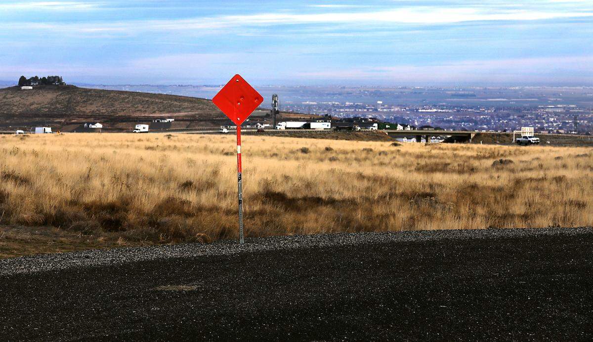 South Adair Road in Benton County ends with a red warning sign just south of the Highway 395 and Interstate 82 interchange south of Kennewick.