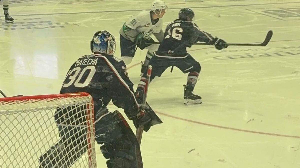 Goaltender Lukάš Matěcha (left) and forward Savin Virk (right) prepare for puck movement fresh off a face-off on the Sunday, March 23 makeup game against the Seattle Thunderbirds at the Toyota Center in Kennewick, Wash.