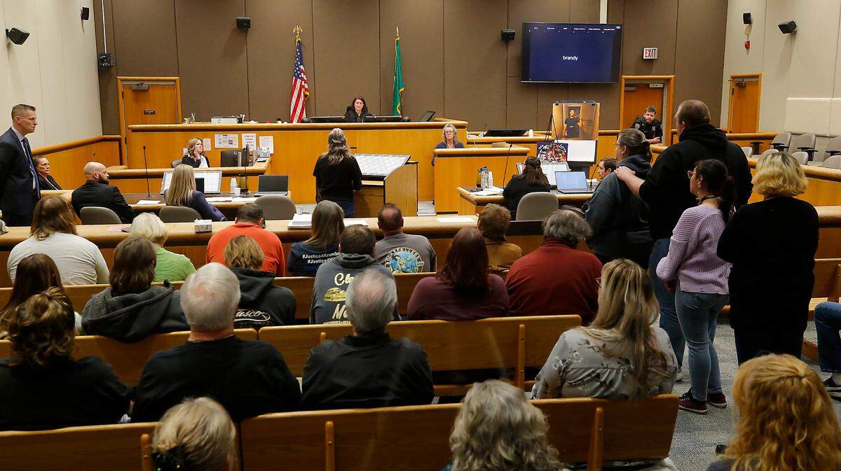 A group of Richland Fred Meyer employees, co-workers of murder victim Justin Krumbah and shooting survivor Mark Hill, line up to speak at Monday’s hearing in Benton County Superior Court for shooter Aaron Kelly. Kelly was found not guilty by reason of insanity for the crimes and was committed to the custody of Eastern State Hospital.