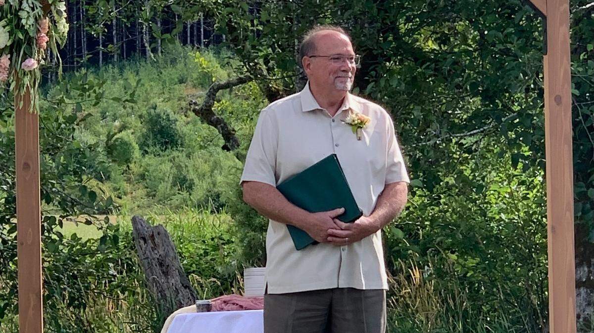 Retired chaplain Tim Ledbetter stepped in at the last minute to officiate for his late friend’s daughter’s wedding. He quipped, “Another serendipity: my attire matched the groomsmen’s color scheme! Who knew the next clean thing in my closet would seem intentional?”