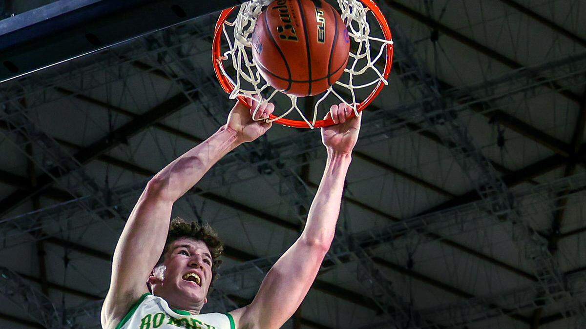 Richland’s Lance Horntvedt (3) dunks during the WIAA Class 4A boys state basketball quarterfinals Thursday, March 5, 2026 at the Tacoma Dome in Tacoma. Horntvedt scored 20 points as Richland defeated West Valley 76 to 62 to advance to the semifinals.