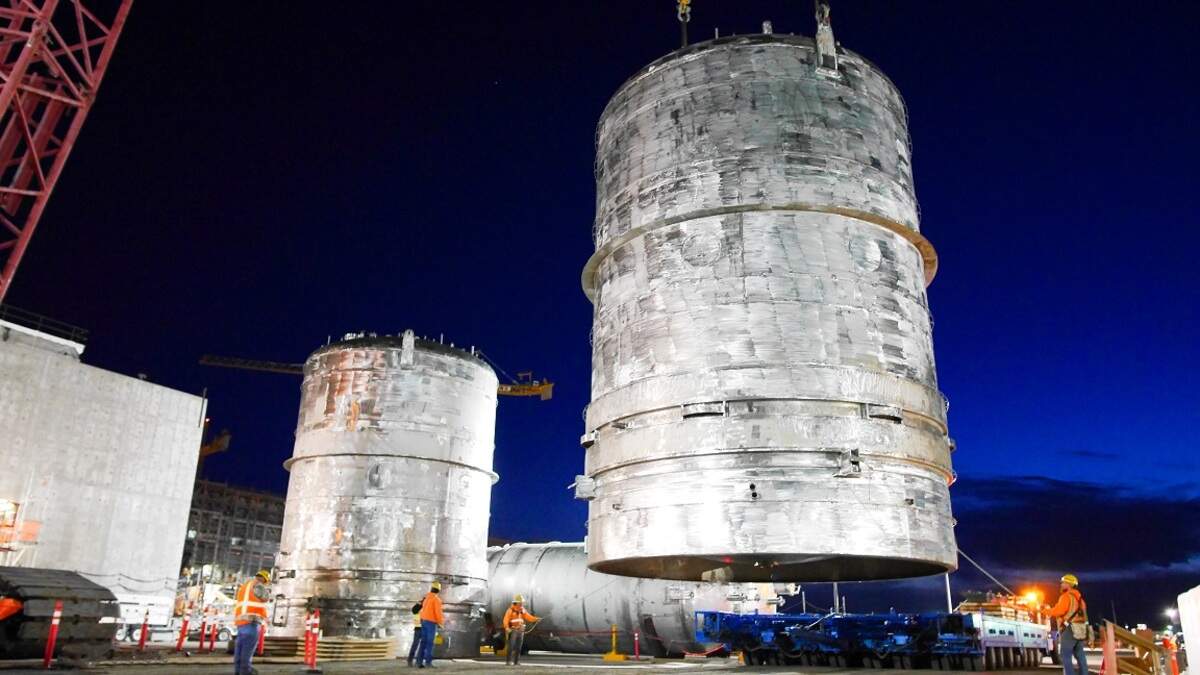 Lampson Crane of Kennewick unloaded two 160-ton tanks from a barge and loaded them onto trailers in Richland to be hauled to the vitrification plant in central Hanford.
