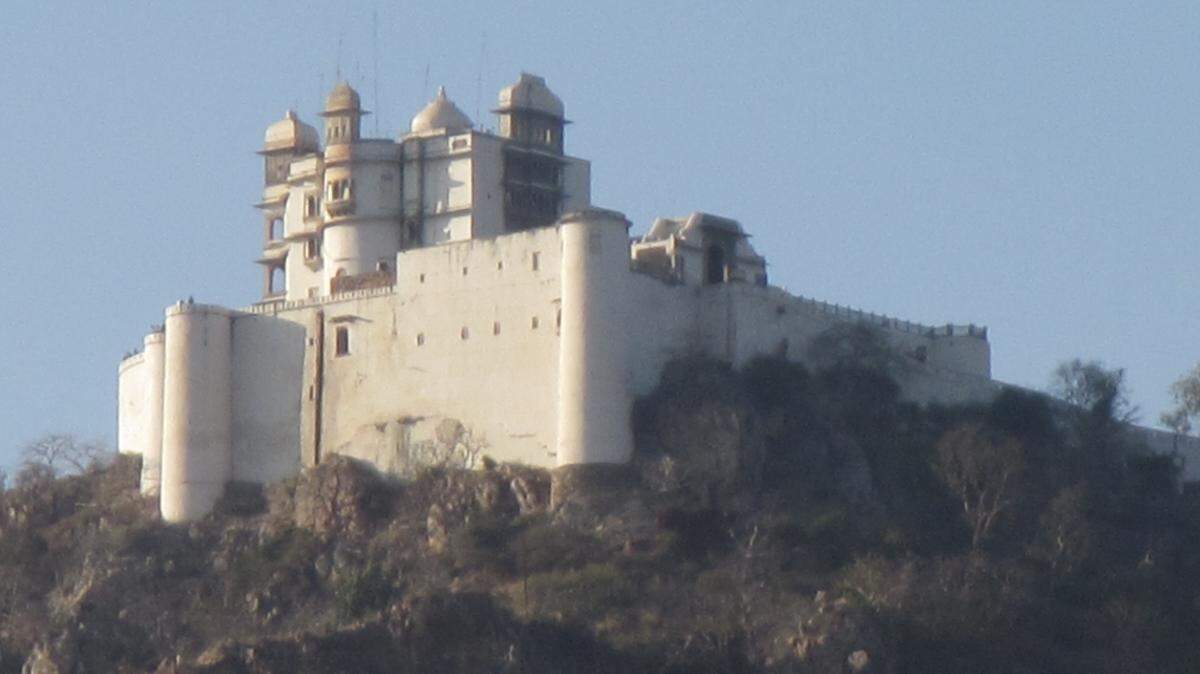 The Monsoon Palace, Udaipur Rajasthan, India sits high above the city on Bansdara Peak.