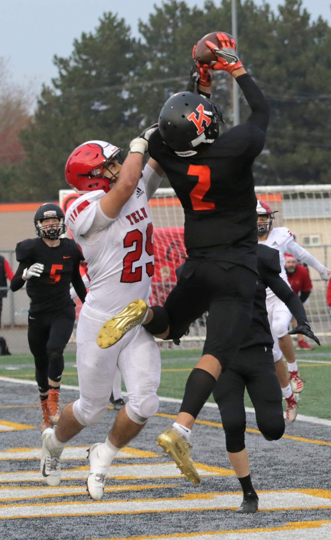 Kennewick’s Simeon Howard (2) scores in overtime.