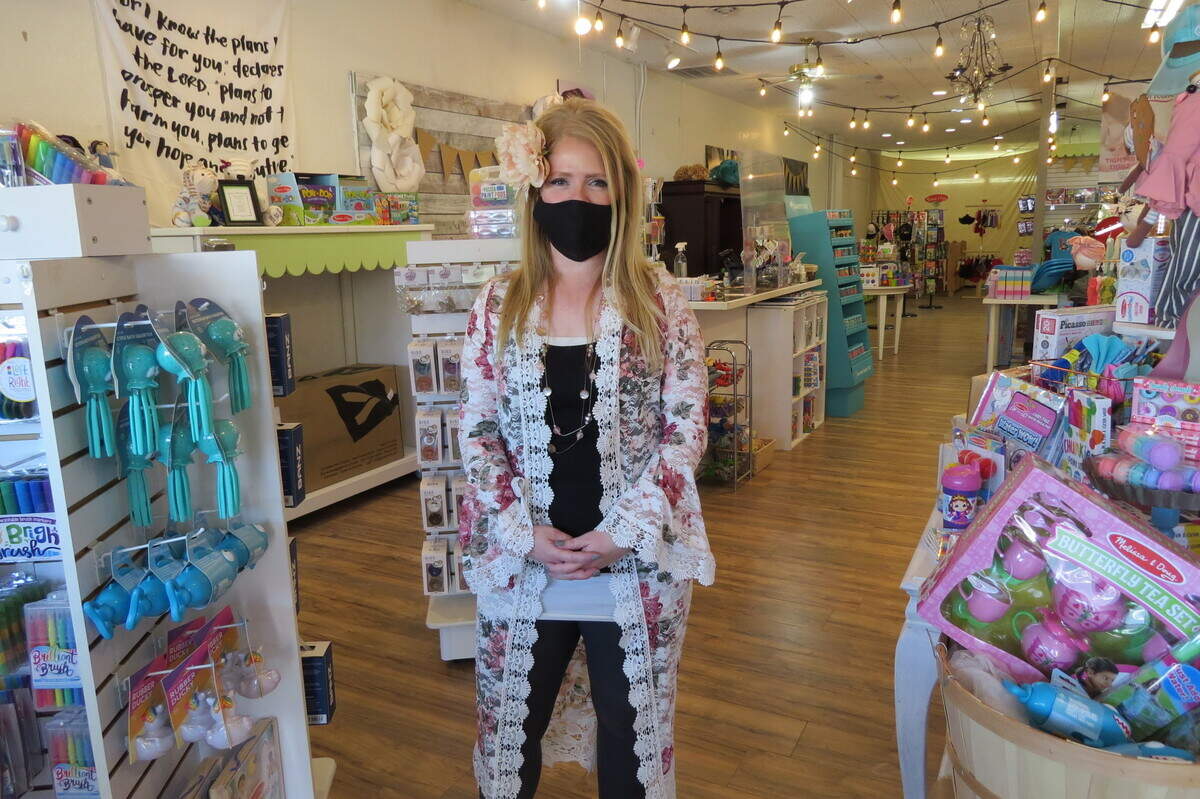 Misti Selman opened the doors of her children’s boutique to customers in downtown Kennewick on Friday after Benton and Franklin counties officially moved to a modified Phase 1.