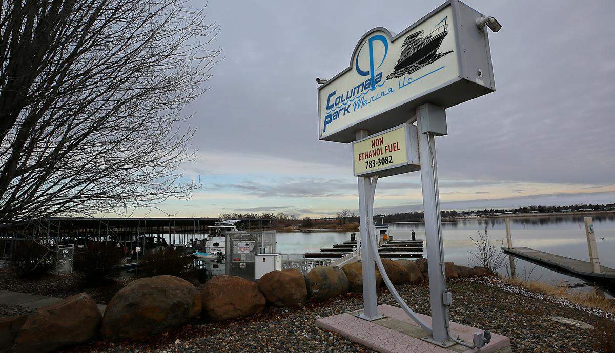 A plan to breach the causeway to the island to allow the Yakima River to flow around the island is forcing closure of the longtime marina.