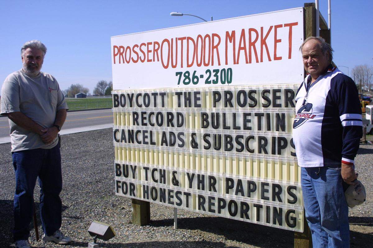 Prosser businessmen Larry Loges and Larry Brunelle were asked by the Prosser Chamber of Commerce to tone down the political messages on their readerboards.