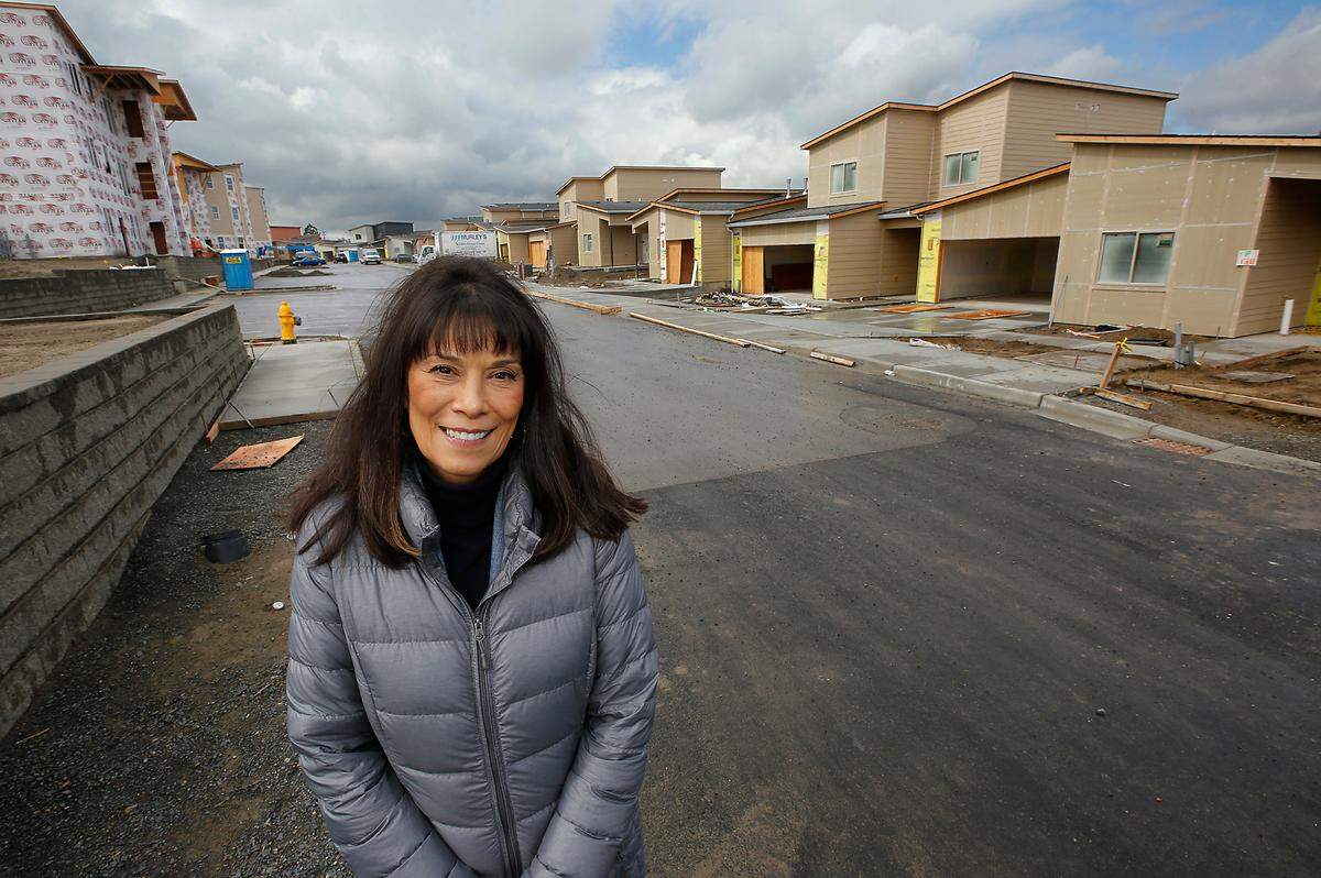 Developer Carmen Villarma recently stands on a roadway through The Resort at Hansen Park complex off 10th Avenue, just west of Columbia Center Boulevard.