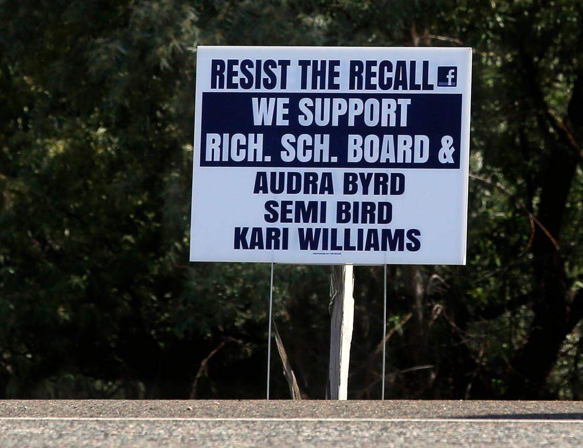A sign supporting the three Richland School Board members facing a voter recall is posted on Columbia Park Trail at the intersection with Leslie Road in Richland.