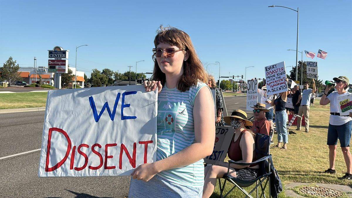 Protesters outside Columbia Center in Kennewick, Wash. on July 17’s “Good Trouble Lives On” national day of action spoke about feeling a need to act, that they were responsible for speaking up and coming together to address their concerns with the direction of the country. 
