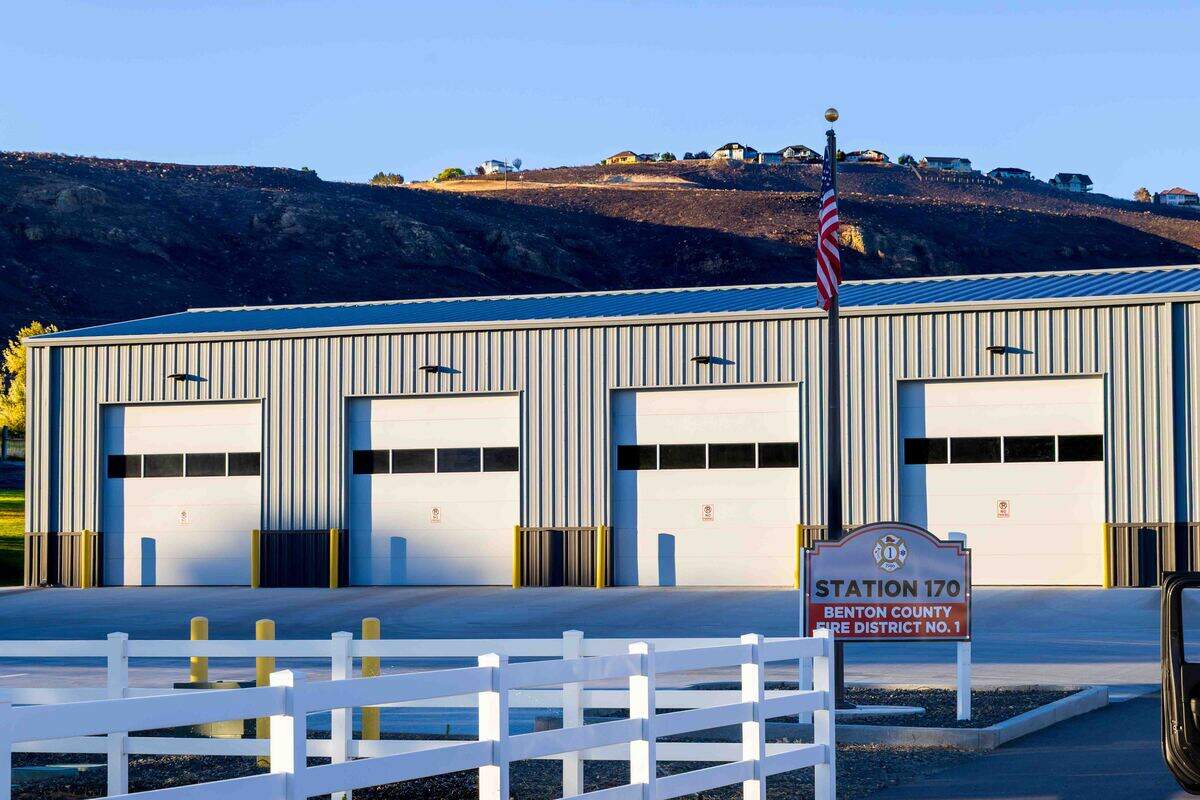 The hillside behind Fire Station 170 is blackened after a wildfire on July 4.