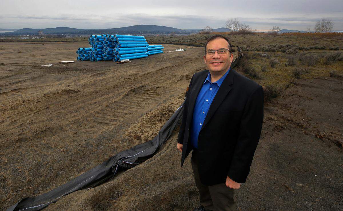 Matt Watkins, Pasco Aquatics Center project manager, stands near the acreage under development off future Road 108 in west Pasco where the Pasco Aquatics Center will be constructed.
