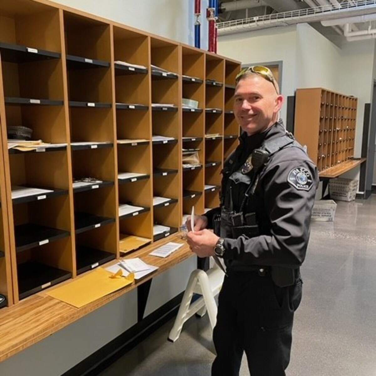 A Pasco police officer is back at work after being shot in December.