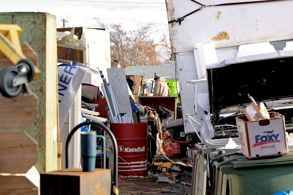 Homeowner Taylor Knipp is seen outside his Pullen Street home in Richland in January. The city previously paid a company to remove debris from the right of way.