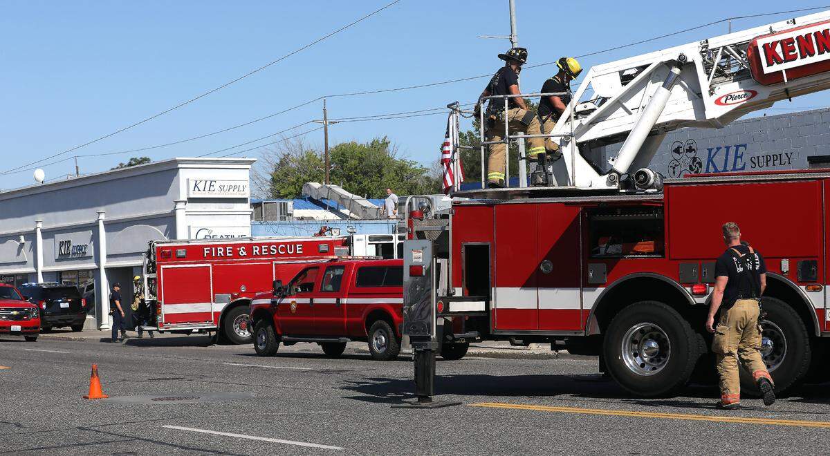 Kennewick Fire Department trucks temporarily block the westbound lanes of East Columbia Drive in downtown Kennewick after responding to extinguish a “small fire” in a storage building for the KIE Supply business. Traffic was congested during the incident and had to detour around the scene.