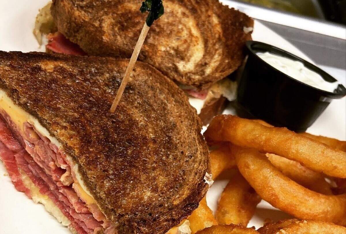 Grilled Reuben sandwich and onion rings at Angel’s Cafe in Pasco.