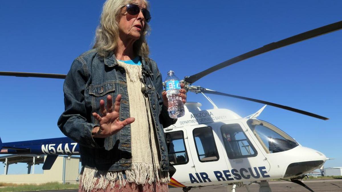 Ann Rodgers recalls being lost in the eastern Arizona mountains for nine days before being rescued, while at the Arizona Department of Public Safety hangar in Tucson International Airport on Wednesday. Rodgers, of Tucson, Ariz., was headed to Phoenix and got lost near the White Mountains east of the Phoenix area. Her hybrid car ran out of gas and electric power, leaving her stranded in the middle of nowhere. Rodgers was rescued on April 9.
