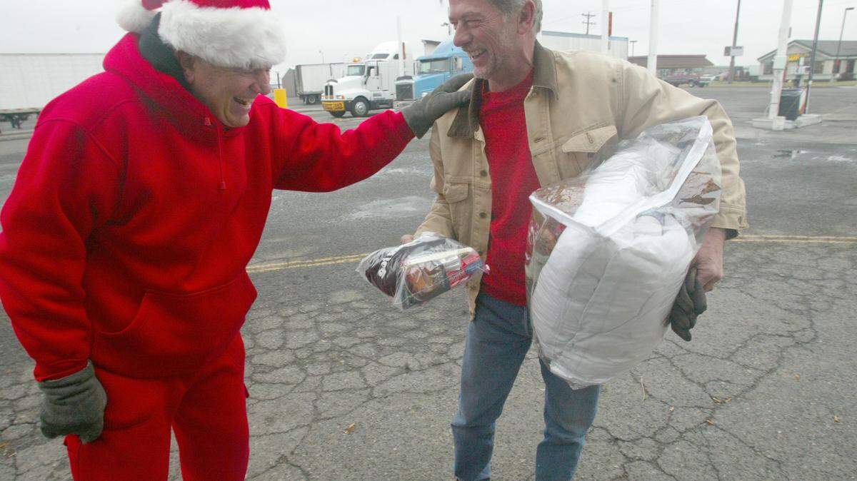 Don Thayer, left, shares a laugh with Chuck Hayes, a truck driver from Spokane. Thayer and his wife Liz created Compassion Center Association in 1998 to minister to truck drivers after their departure from the Tri-City Union Gospel Mission. Thayer died March 28 in Toppenish.