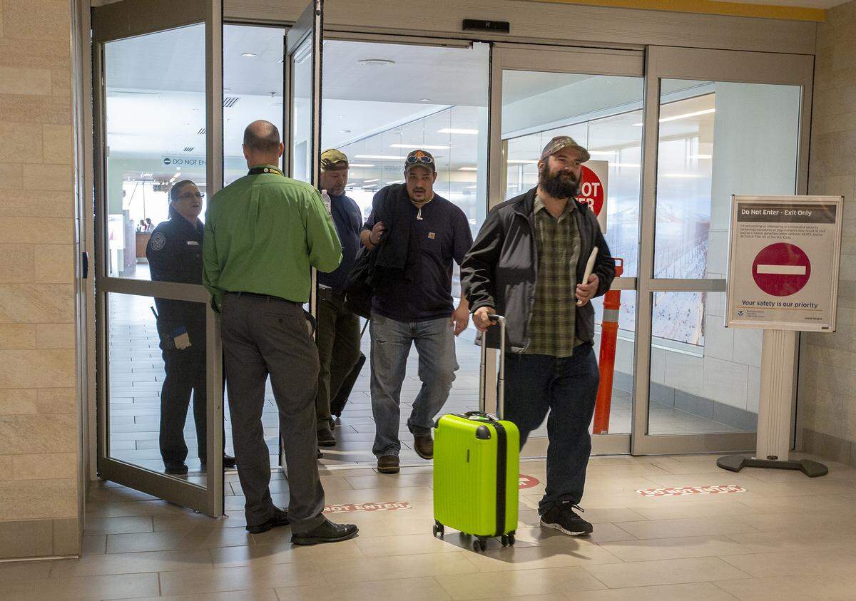 Flight passengers exit the Tri-Cities Airport in Pasco on Wednesday. The airport broke its old passenger record in 2018, handling 785,164 passengers.