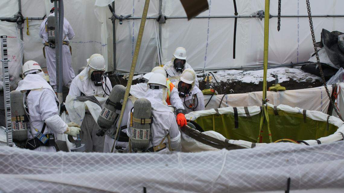 Hanford nuclear reservation workers prepare to remove radioactive waste from a leak-prone underground tank.