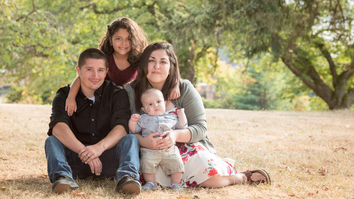 Myles Mabus and Skeasha Ascencio with their children, Nina, 6, and Nehemiah, 10 months, who’s being treated for leukemia.