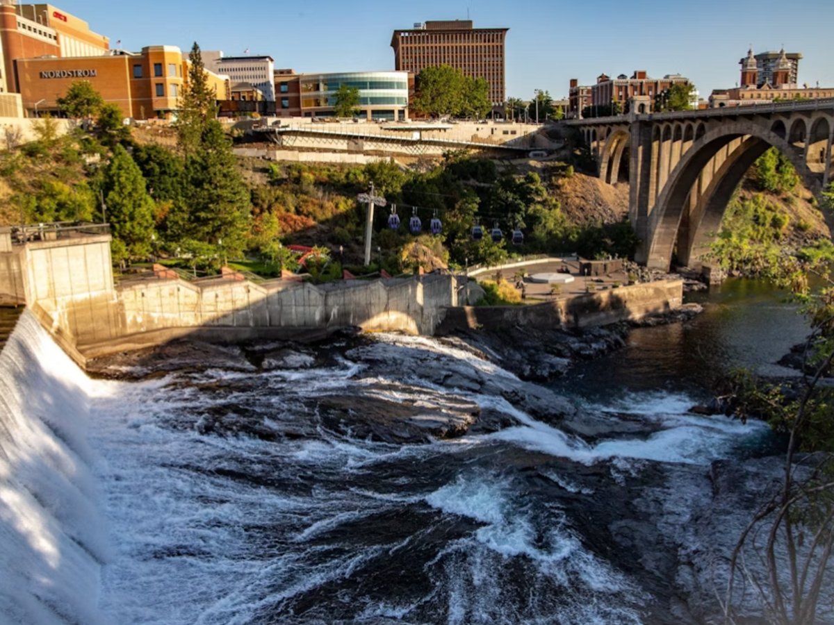 The park sits along the Spokane River, offering prime viewing access of the Falls.