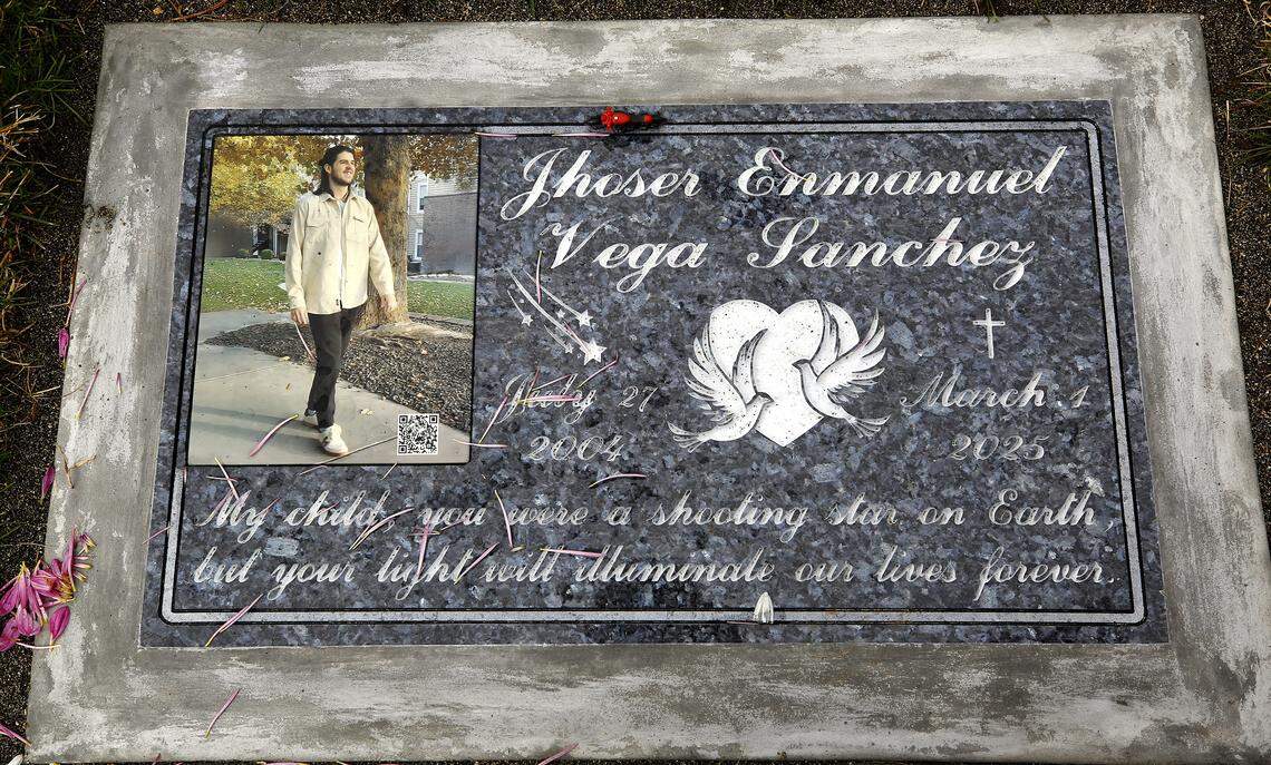 Flowers and a small motorcycle adorn the grave of Jhoser E. Vega Sanchez, 20, of Richland, who died in a crash involving off-duty Washington State Patrol Trooper Sara Clasen, on the 1-year anniversary of his death.