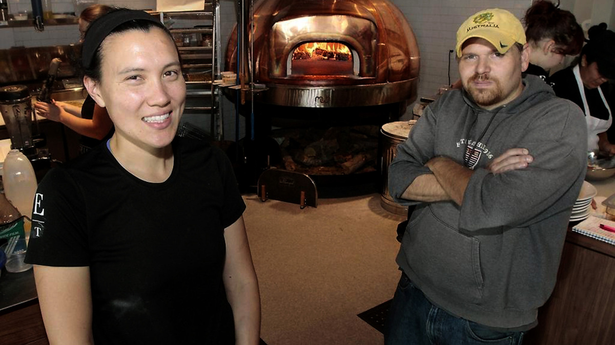 Angela Kora, left, and Scot Newell, co-owners of Ethos Bakery & Trattoria, at the 2015 grand opening of the restaurant in north Richland. The duo is retooling the business to focus on events and catering.