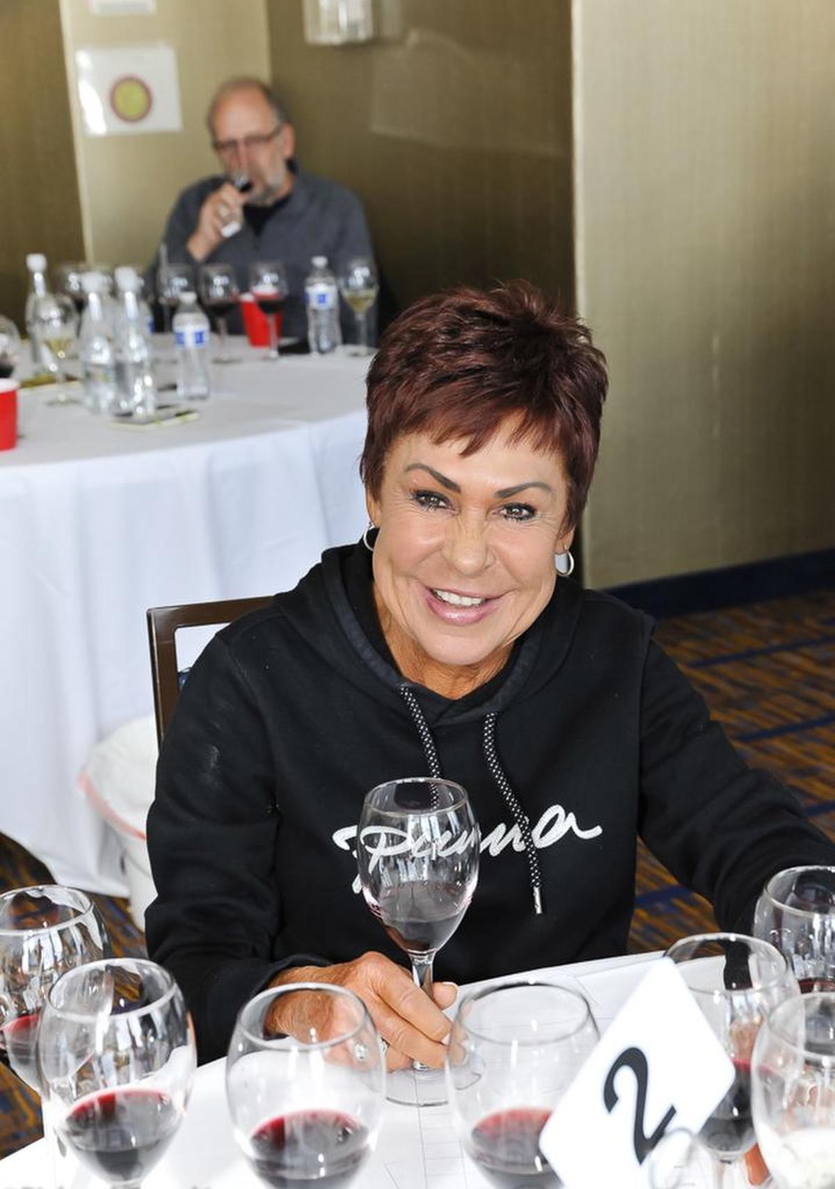 Kat Dykes, wine concierge at The Lodge at Columbia Point, judges a flight of red wine at the seventh annual Cascadia International Wine Competition in Richland, Wash.
