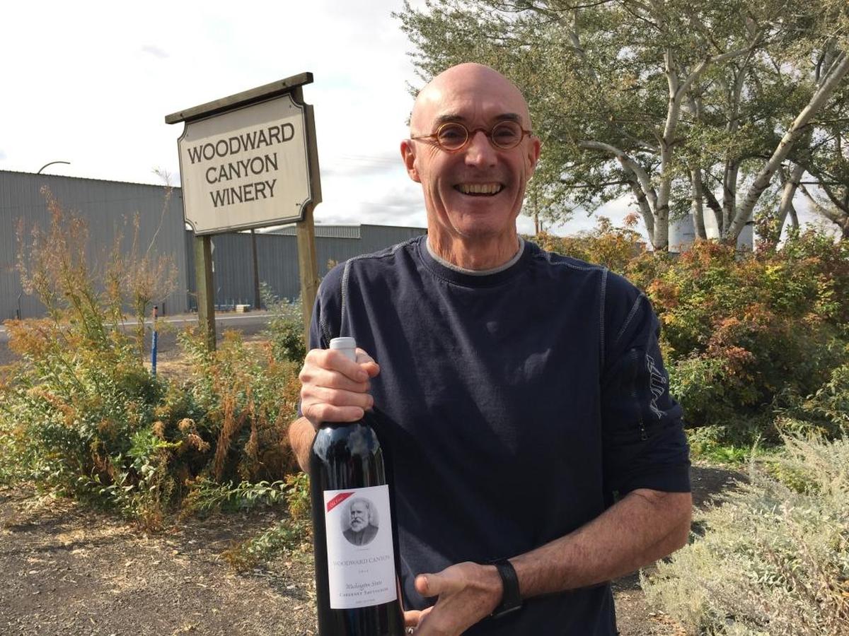 Woodward Canyon owner Rick Small holds a bottle of his Old Vines Cabernet Sauvignon at thewinery in Lowden, Wash.