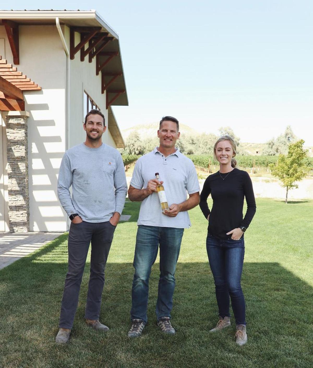 Greg Koenig, center, used a 2018 Riesling Ice Wine to win the 2019 Idaho Wine Competition for James and Sydney Nederend, the new owners of Koenig Vineyards in Caldwell. (Photo courtesy of Koenig Vineyards)
